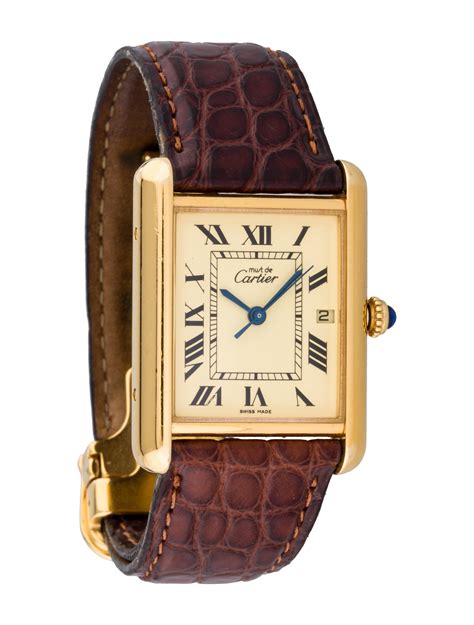 cartier le must tank watch.